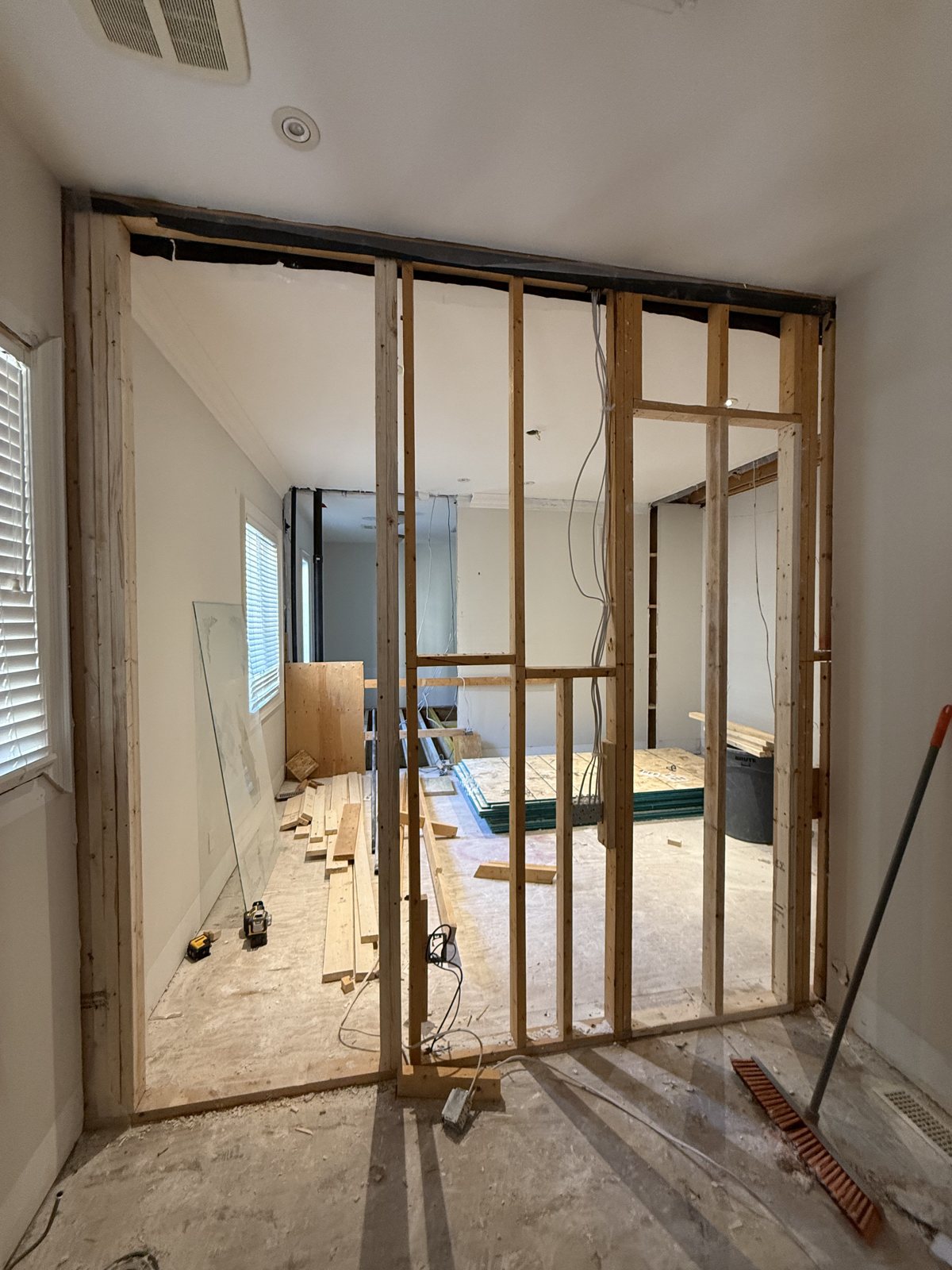 Wall removal and framing during a Toronto renovation — SQFT Contracting